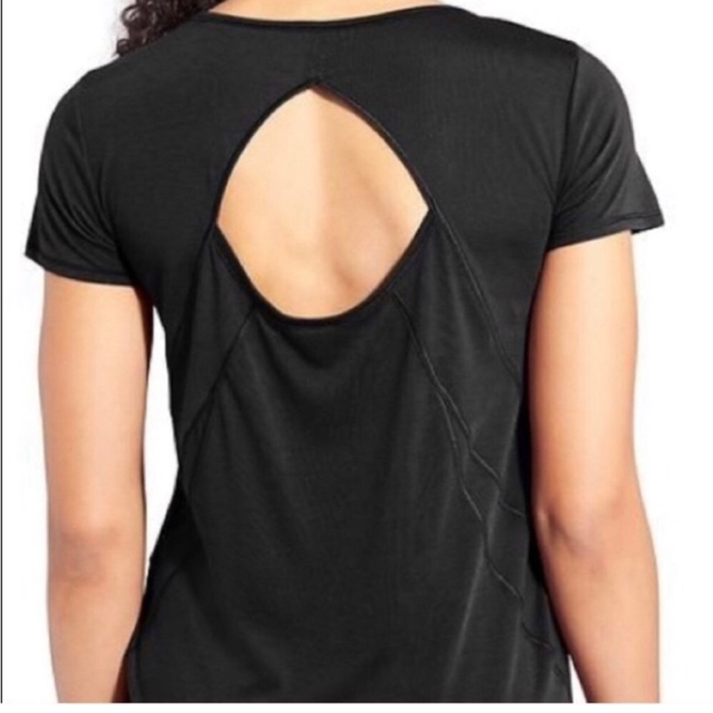 Athleta workout tee with back cut out. I’m great condition size XL